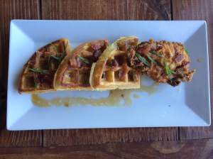 Yummy chicken and waffles at Three Sheets Uptown. Photo by: Manny Garcia.